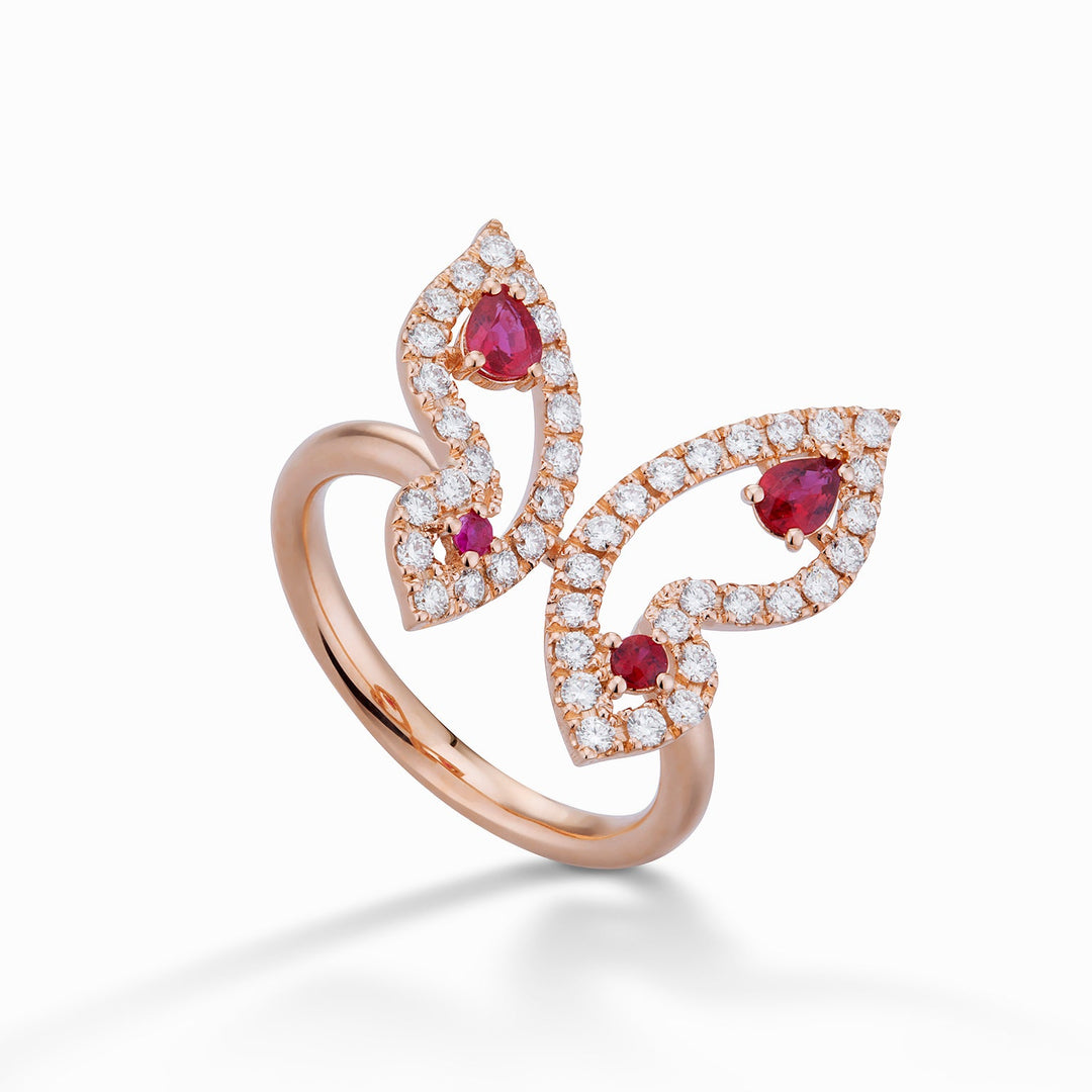 Golay pequeño anillo de mariposa con diamantes y rubíes